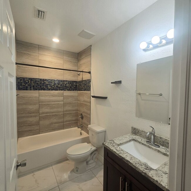Building Photo - MUST SEE -2/2/1+OPEN DEN-DUPLEX IN GREENBR...