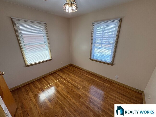 Building Photo - 2-Bedroom Home with Hardwood Floors