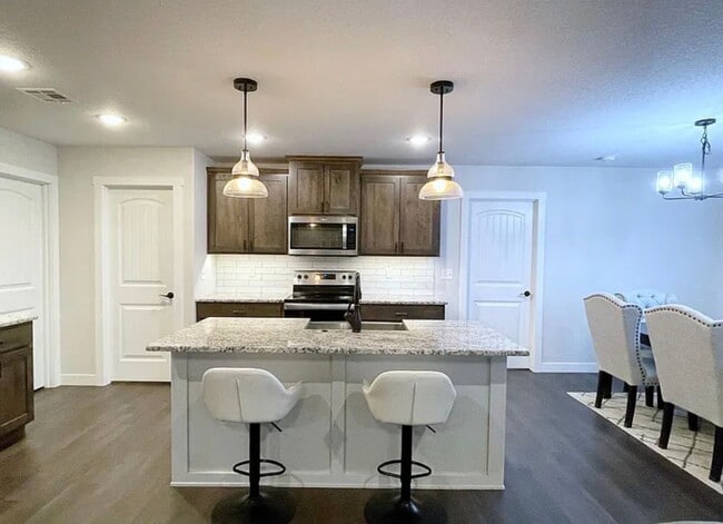 Building Photo - 3-Car Garage + Spacious Yard + Stainless Appliances + Fireplace + Near NEW Oliver Brown Elementary