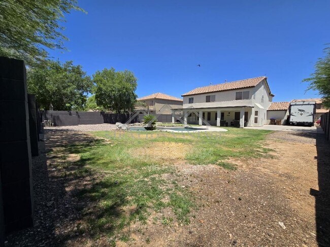 Building Photo - 1005 E Stirrup Ln