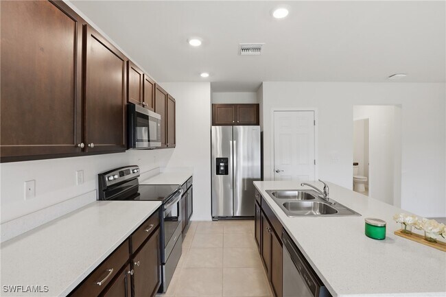 Building Photo - 15368 Wildflower Cir