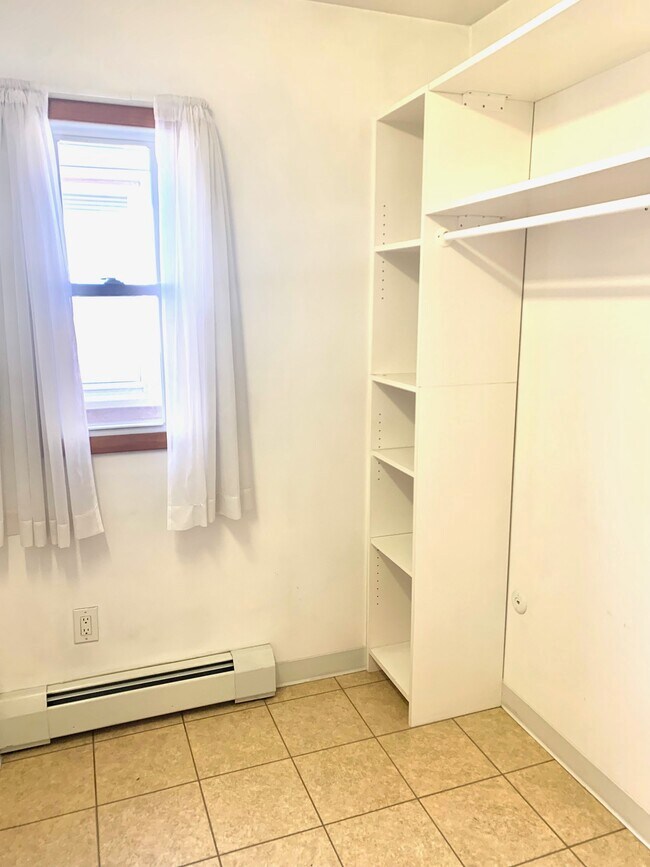 Part of the large walk-in-closet attached to the Primary bedroom - 203 5th St