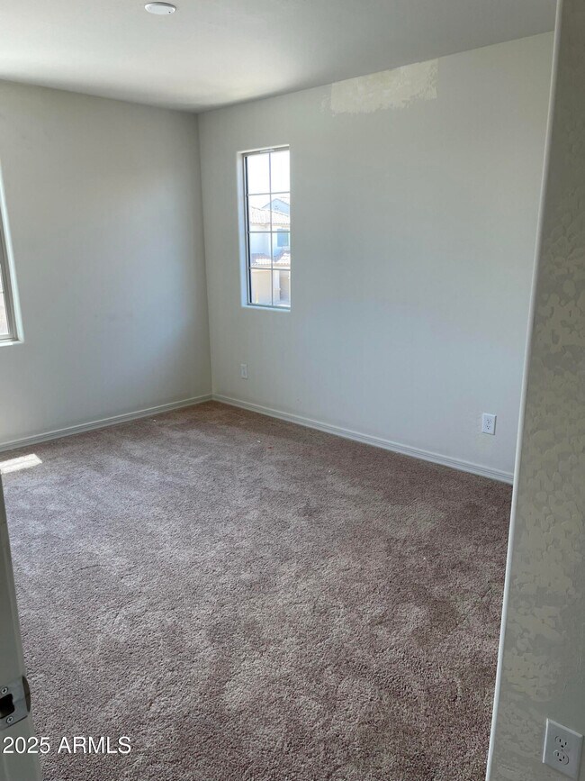 Building Photo - 8960 W San Miguel Ave