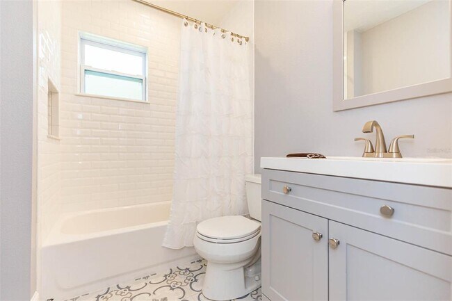 Building Photo - 3911 W Tyson Ave