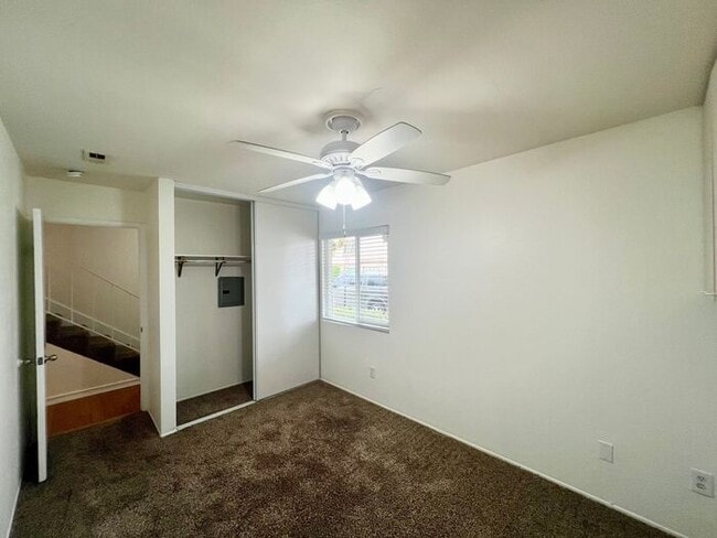 Building Photo - Stunning 4BR Townhome with Hardwood Floors, Private Patio, Community Pool & 2-Car Garage!