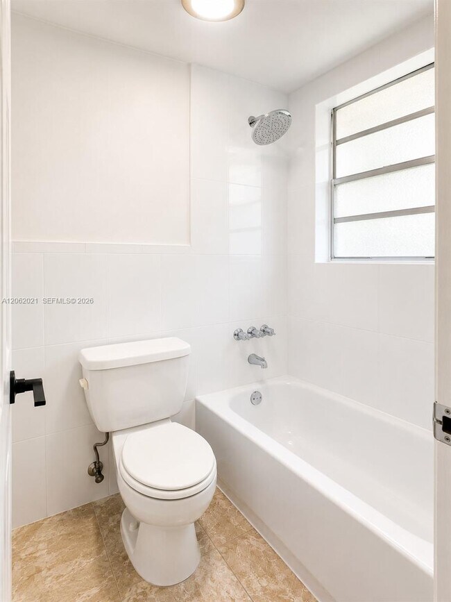 Building Photo - 6095 W 18th Ave
