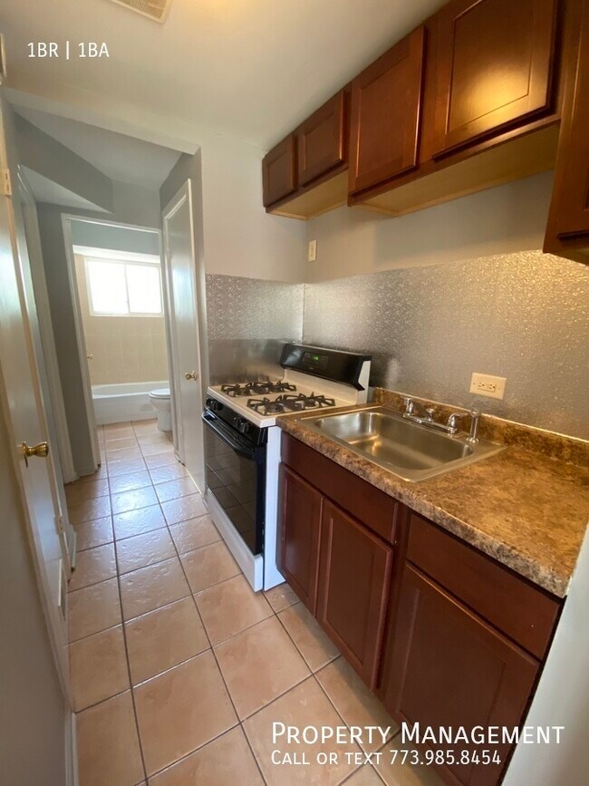 Building Photo - 8850 S Saginaw Ave