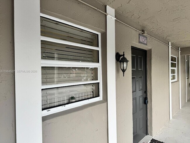 Building Photo - 11207 Royal Palm Blvd