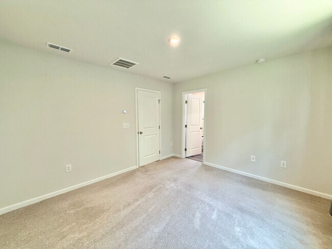 Building Photo - Stunning 3BD, 2.5BA End Unit Zebulon Townh...