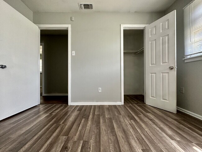 Building Photo - Updated Home with Gorgeous Floors & Large Backyard