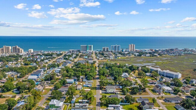 Building Photo - SNOWBIRD RENTAL- 4 blocks 2 Sea & Fire Pit