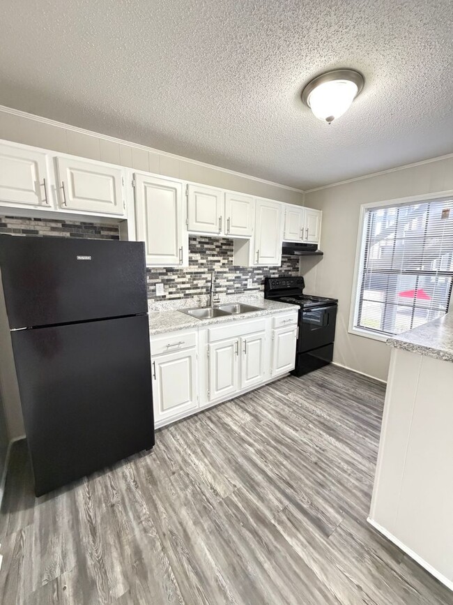 Building Photo - April Savings Are Here! Application Fee WAIVED ALL month!