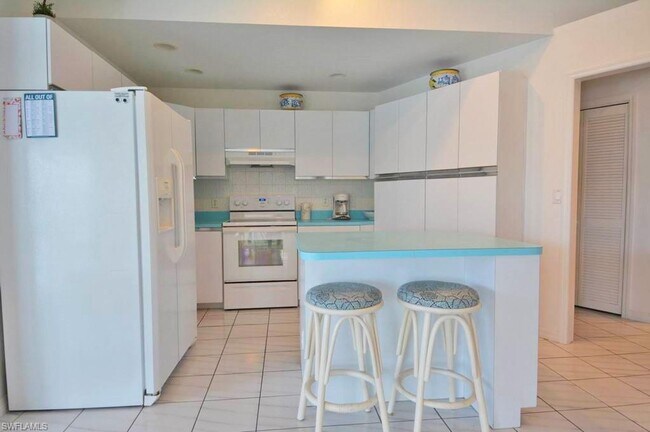 Building Photo - Spacious and Meticulously Maintained Water...