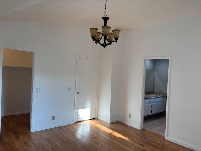 Master bedroom with a walk in closet - 8724 Edmonton Pl