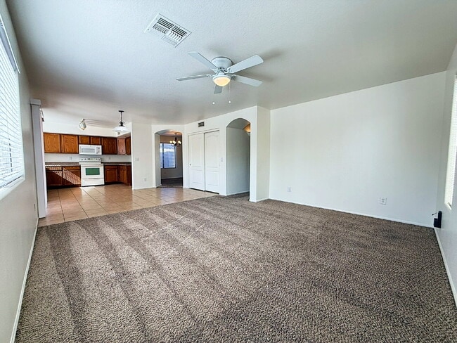 Building Photo - Spacious & Stylish in the Heart of Surprise!