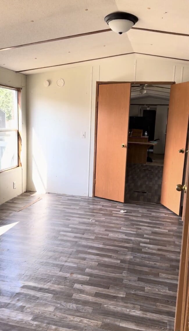 Building Photo - Handyman Special – Land + Home (Rent-to-Own)