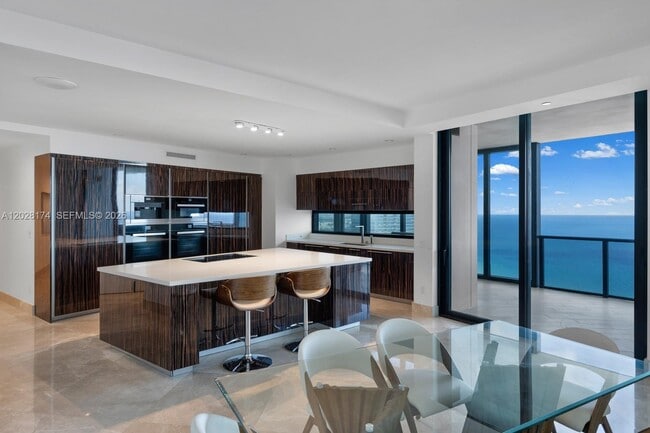 Building Photo - 18555 Collins Ave