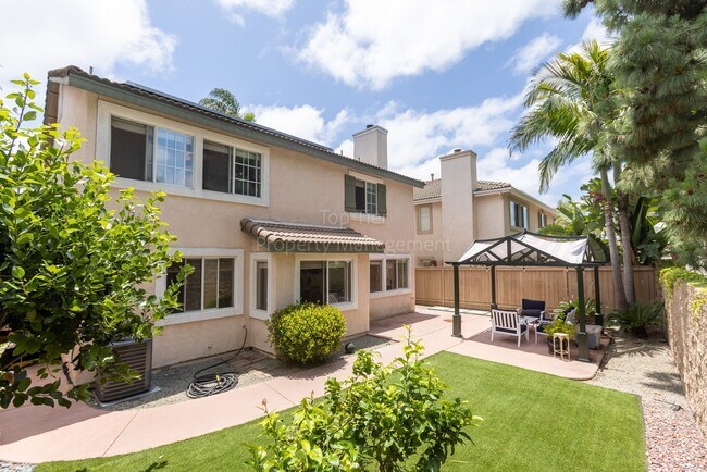 Building Photo - Gorgeous upgraded 4 bed 2.5 bath 2,216 sqft home with Remodeled Kitchen, Hardwood Floors, Tesla S...