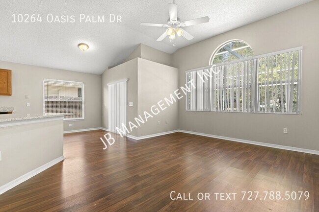 Building Photo - 10264 Oasis Palm Dr