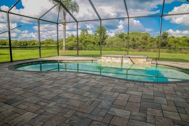 Building Photo - Elegant 5-Bedroom Pool Home with 3-Car Gar...