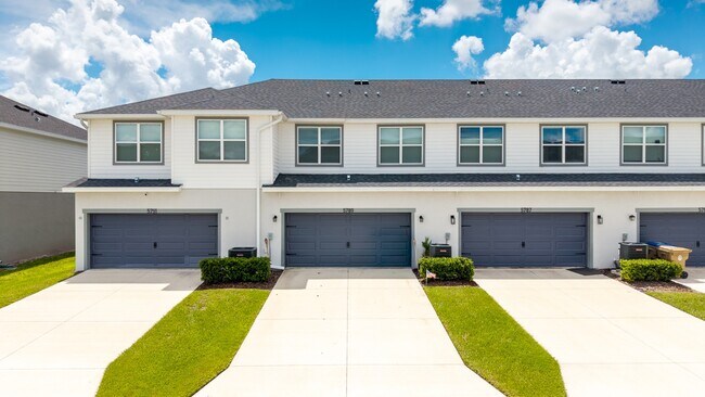 Building Photo - 3BR Center Lake Townhome | 2-Car Garage, Loft & Resort-Style Amenities