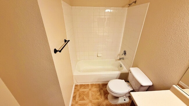 Building Photo - NEW CARPET NEW PAINT!! Clean and Bright 2BR 2BTH Condo Close To DIA. Gated Community in First Cre...