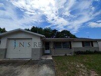 Building Photo - Large 1270 Sq. Ft. 3/2/1 tile floors, walk-in-closet, indoor laundry, fenced yard and spacious ki...