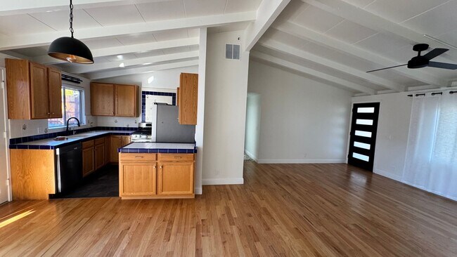 Building Photo - Mission Fields Home, 3 bedroom 2 bath, Fire Place, large fenced yard, 2 car garage fully finished...