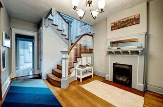 Building Photo - Beautiful two story unit with Victorian charm