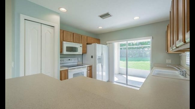 Building Photo - 14250 Tree Swallow Way