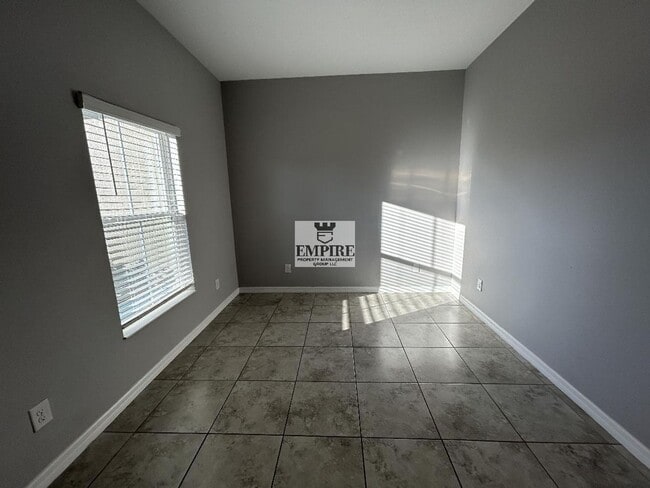 Building Photo - COMING SOON! 3 Beds + Den, 2 Baths, Screened Lanai & More!