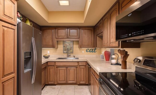 Building Photo - Sophisticated Catalina Foothills Sanctuary: Premium 3-Bedroom Townhome with 2-Car Garage