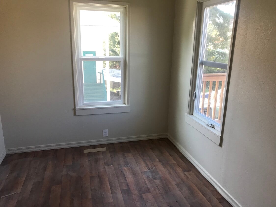 Original hardwood floor in third bedroom. - 314 Rigg St