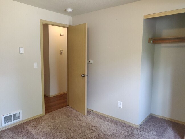 Building Photo - Charming 4-Bedroom Home on 1/2 Acre with a Fenced Backyard, Fully Insulated Double-Car Garage, in...