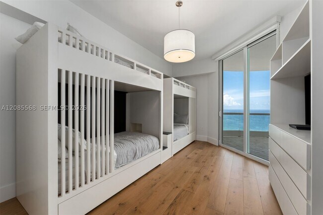 Building Photo - 16047 Collins Ave