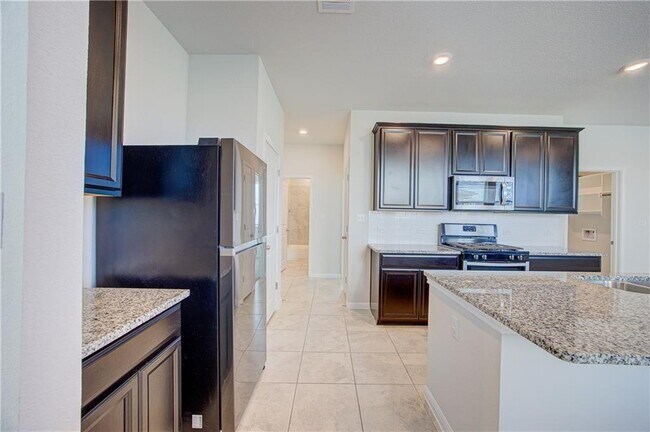 Building Photo - 128 Serpens St