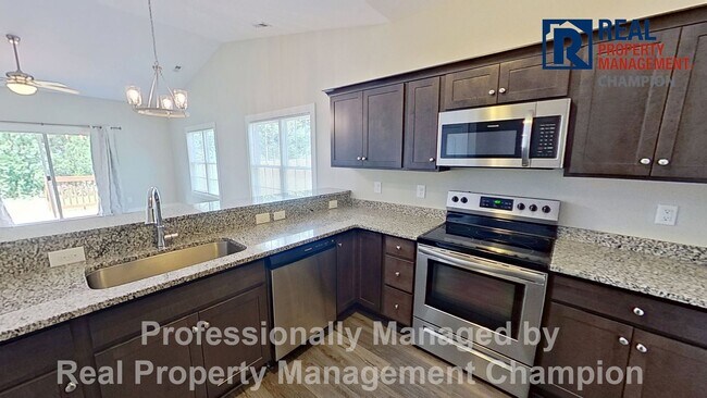 Building Photo - Charming 3 BD/2 BA with Open Floorplan and Attached Garage