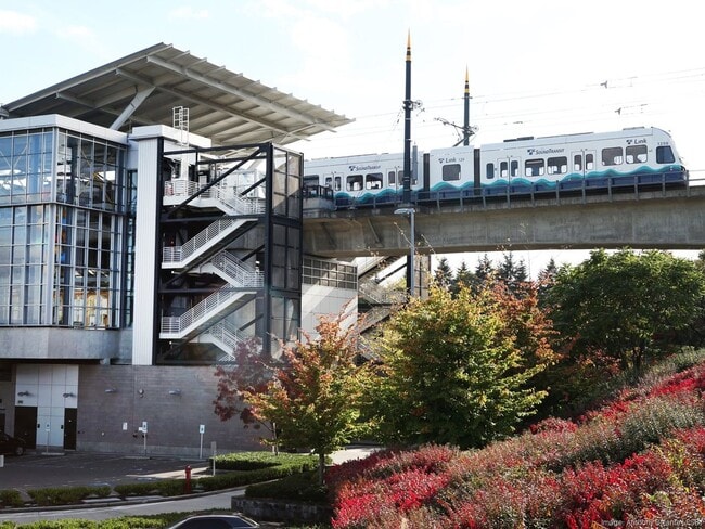 Building Photo - Spacious, Modern Northgate Condo w/ Quartz Kitchen, Secure Parking, Pool & Light Rail Access