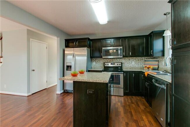 Building Photo - For Rent – Spacious 4 Bedroom Home Near Fo...
