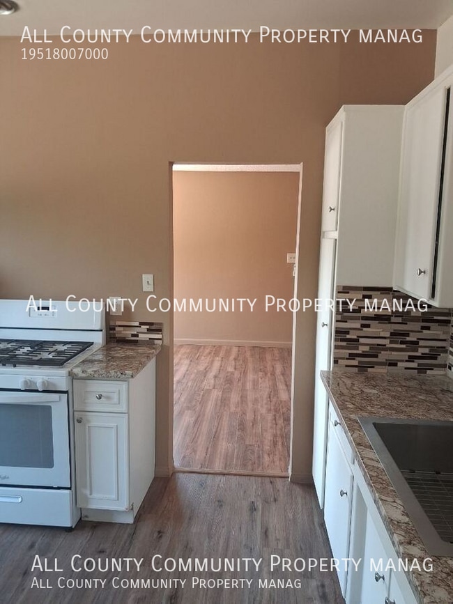 Building Photo - 6080 Daisy Ave