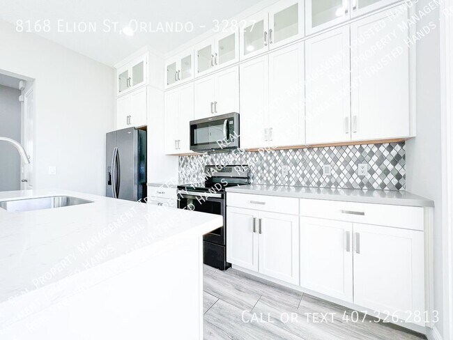 Building Photo - Luxury 4-Bedroom Townhome in Laureate Park...
