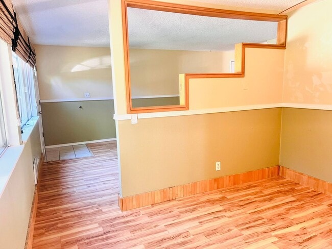 Building Photo - Charming 3BR/1BA w/ 1-car garage, long driveway, fenced yard, wood stove & shed/workshop.