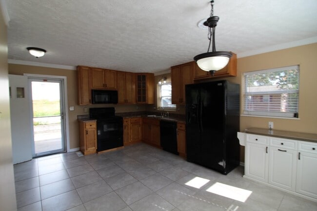 Building Photo - Award winning schools. Stunning home.  Centrally Located. One car garage/fenced in back yard.