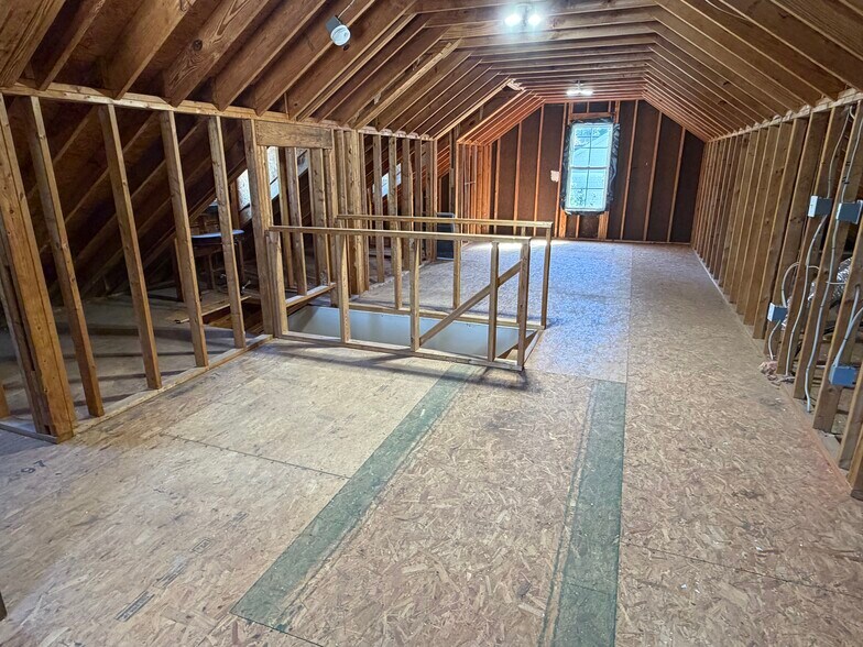 Fully floored walk up attic for storage space! - 6419 Woodmont Rd