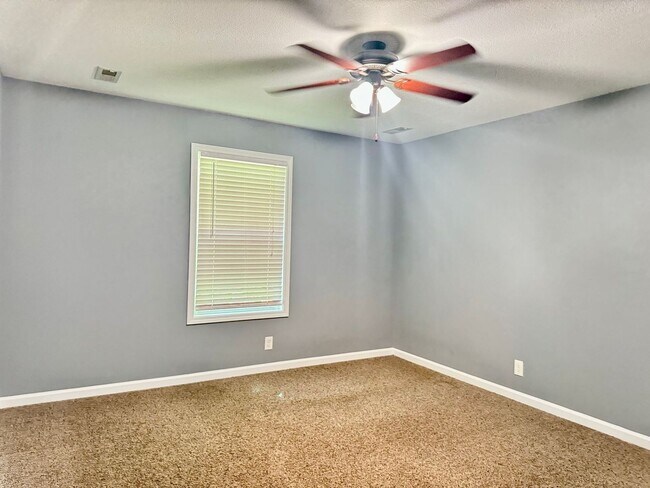 Building Photo - Large Open 4 Bedroom Home with Bonus! Tree Lined Backyard with Privacy Fence!