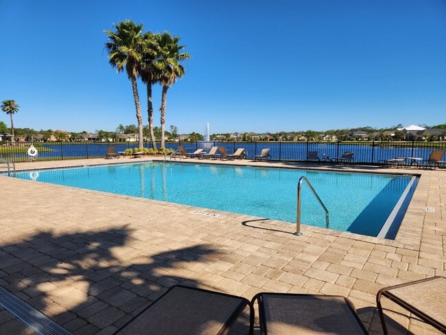 Building Photo - BEAUTIFUL Grande Champion at LPGA Townhome, Lake & Preserve Views, 3 Bedrooms, 2.5 Bathrooms AVAI...