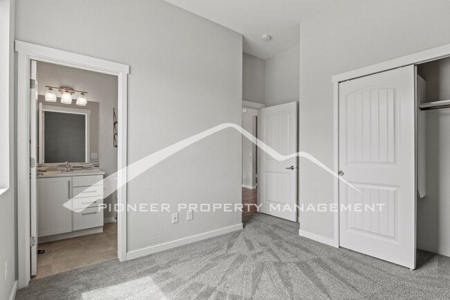 Building Photo - Elegant Ranch-Style Home with Main Floor Primary Bedroom with 3-Car Garage and Finished Basement ...