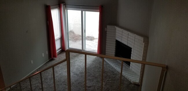 Building Photo - Updated Two Bedroom Condo with Warm Fireplace