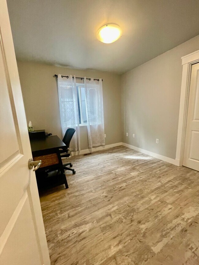 Building Photo - Wonderful Ranch Style home on over an acre in a great location!  3 bed/2 bath/2 car garage with a...