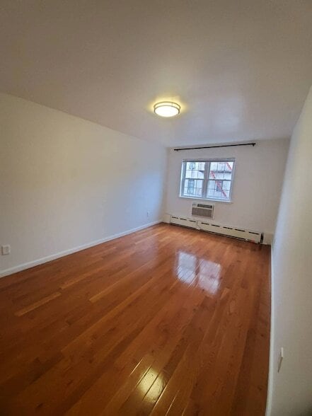 Building Photo - 48-49 47th Street Unit
